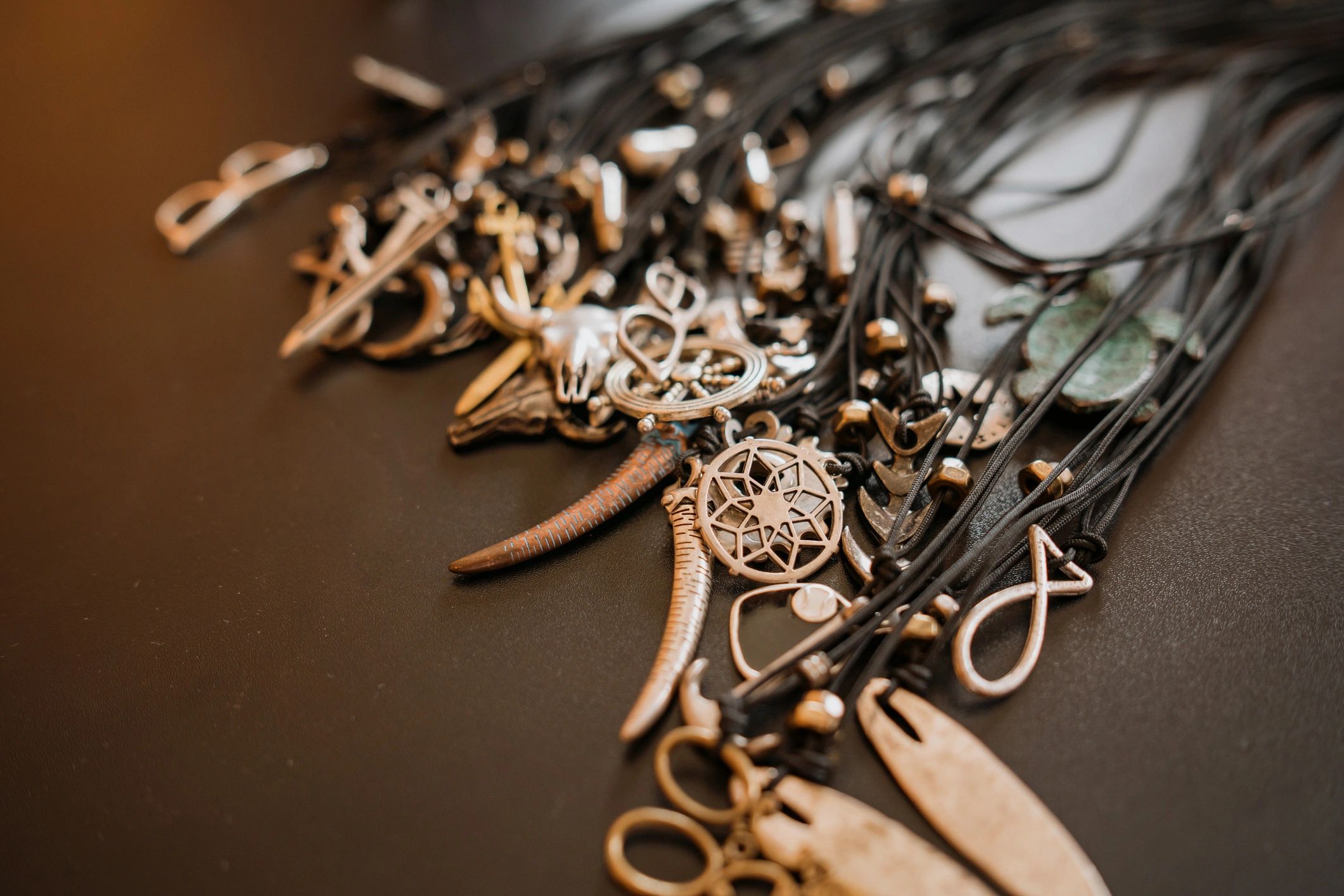 masculine beaded jewelry on dark background